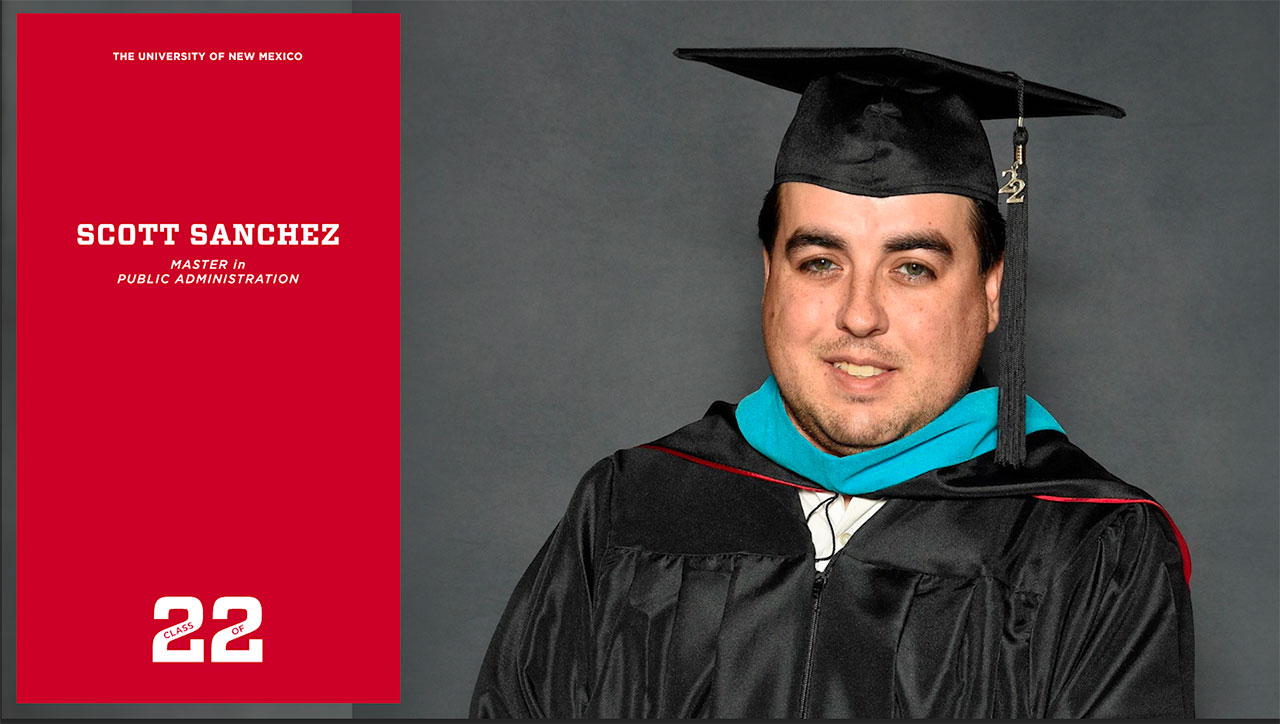 Photo of Scott Sanchez smiling wearing black cap and gown with a gray background